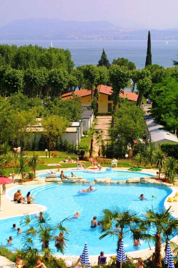 Camping Bella Italia In Peschiera Del Garda - Gardasee Apartamento Exterior foto